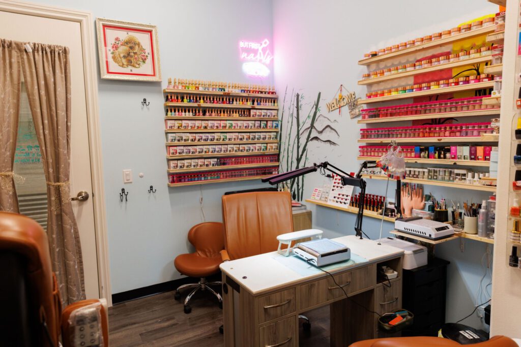 Cozy nail salon workspace with supplies and decor.