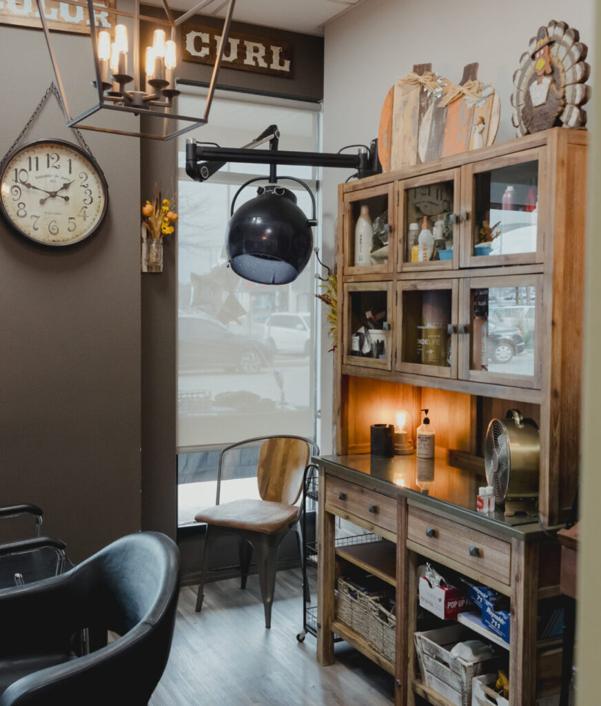 Cozy hair salon with vintage decor elements.