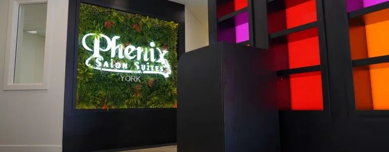 Phenix Salon Suites lobby with colorful decor