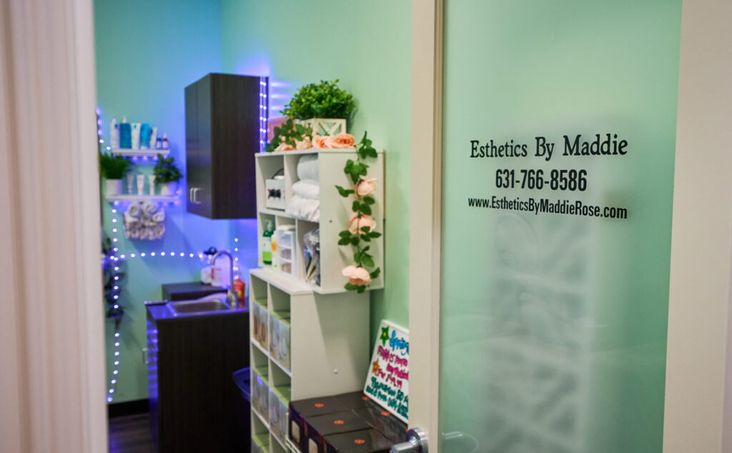 Esthetics studio interior with shelves and sink